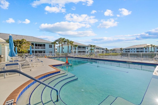 view of pool with a patio area