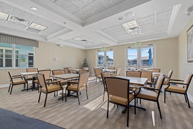 dining area featuring ornamental molding, light colored carpet, coffered ceiling, and beam ceiling