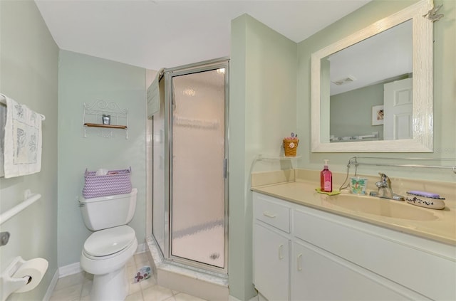 bathroom featuring tile patterned floors, toilet, vanity, and walk in shower