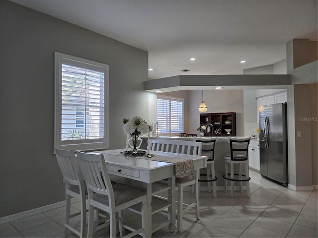 dining room featuring light tile patterned floors