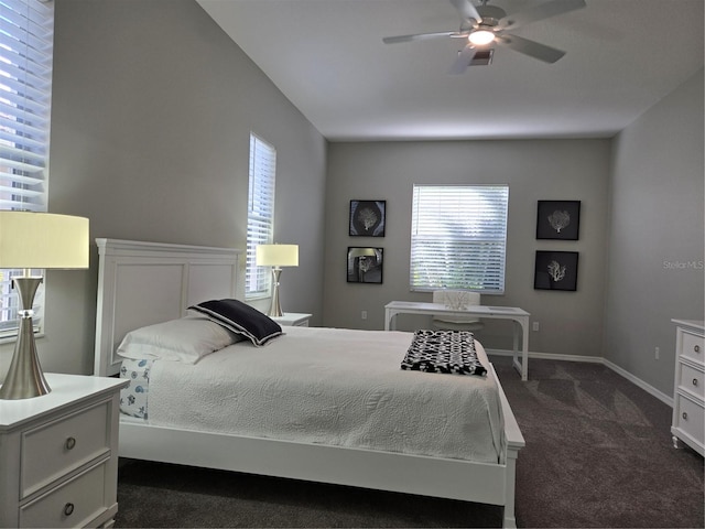 bedroom with dark carpet and ceiling fan