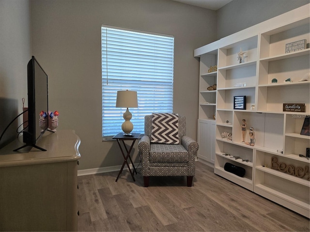 living area with wood-type flooring