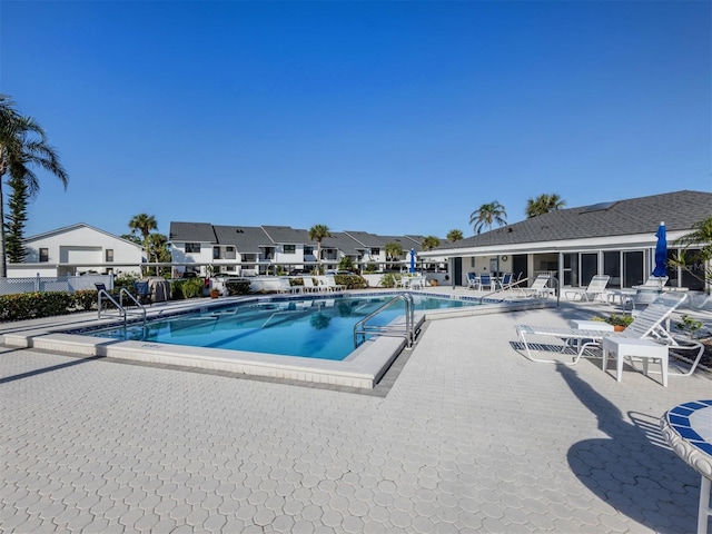 view of pool featuring a patio area