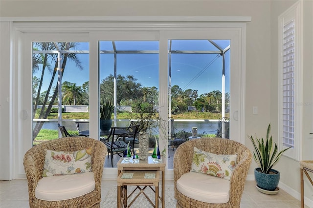 sunroom with a water view