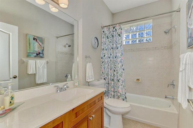 bathroom featuring toilet, shower / bath combination with curtain, and vanity