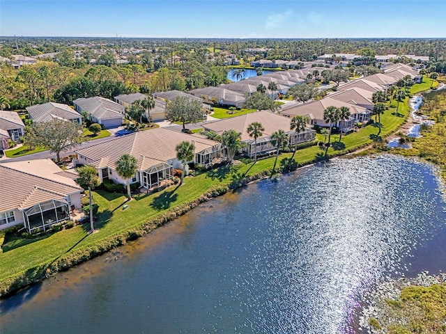 aerial view featuring a water view and a residential view