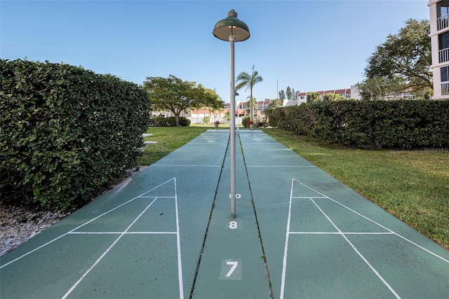 232 Saint Augustine Ave Unit 404, Venice, FL 34285 - view of home's community with a yard and shuffleboard