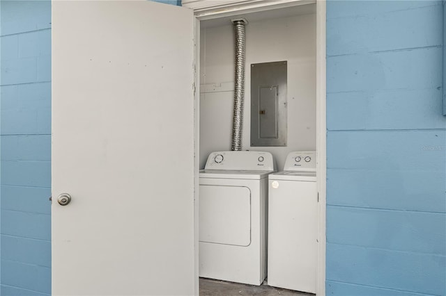 laundry area with independent washer and dryer and electric panel