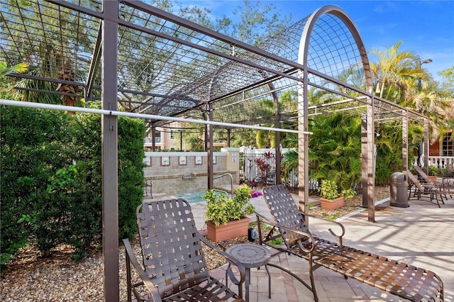 view of patio / terrace featuring a community pool