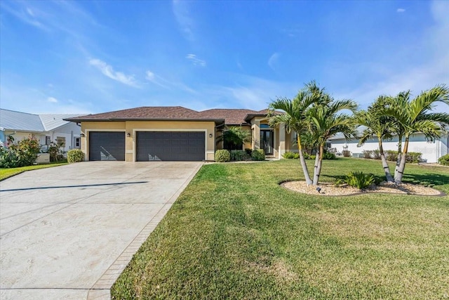 single story home featuring a front yard and a garage