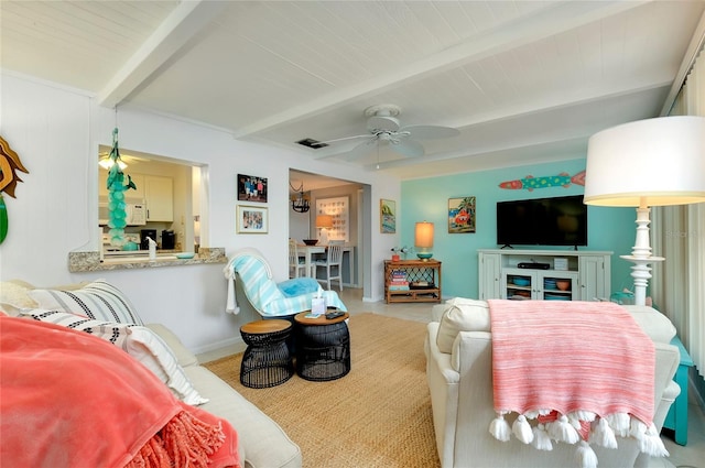 living room with beamed ceiling, ceiling fan, light tile patterned flooring, and wooden ceiling