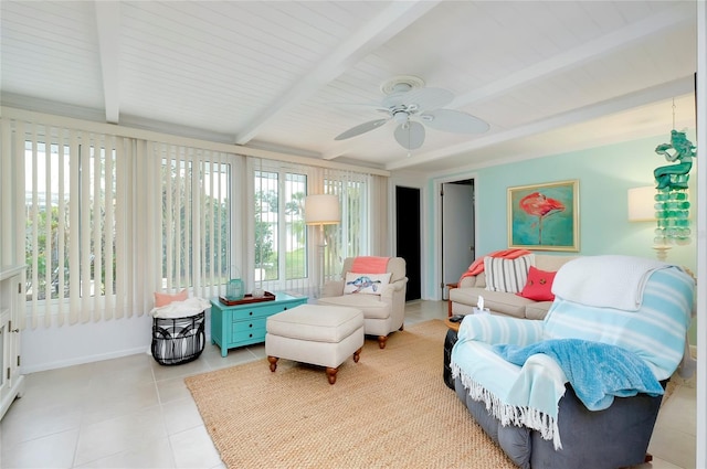 sunroom / solarium with beam ceiling and ceiling fan