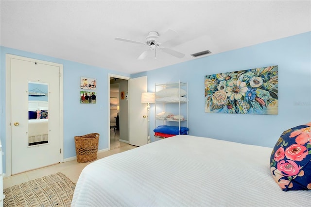 bedroom with light tile patterned floors and ceiling fan