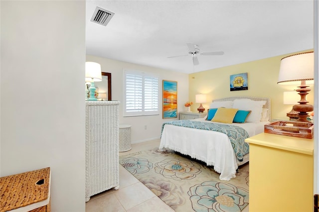 bedroom featuring ceiling fan and light tile patterned floors