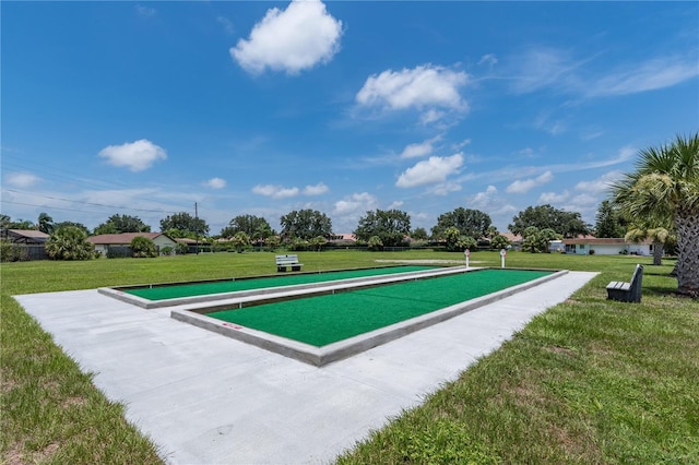 view of home's community featuring a yard