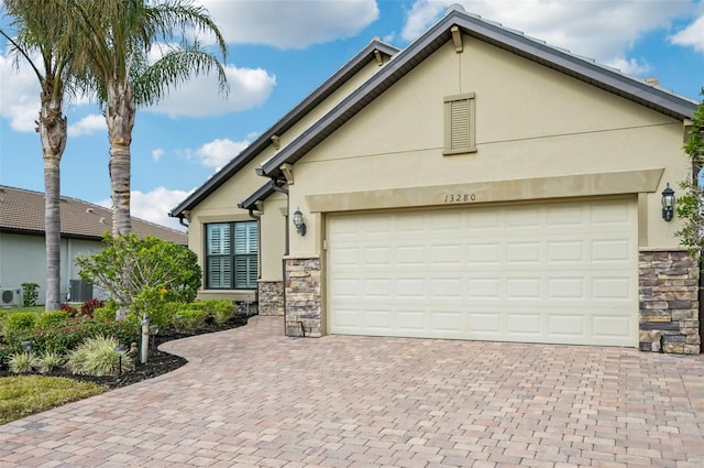 view of front of property with a garage