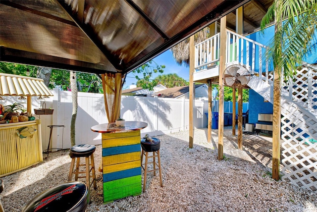 view of patio with a bar