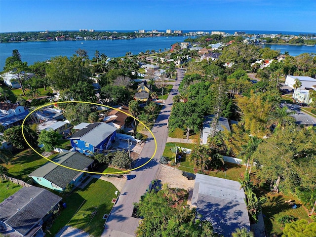 drone / aerial view with a water view