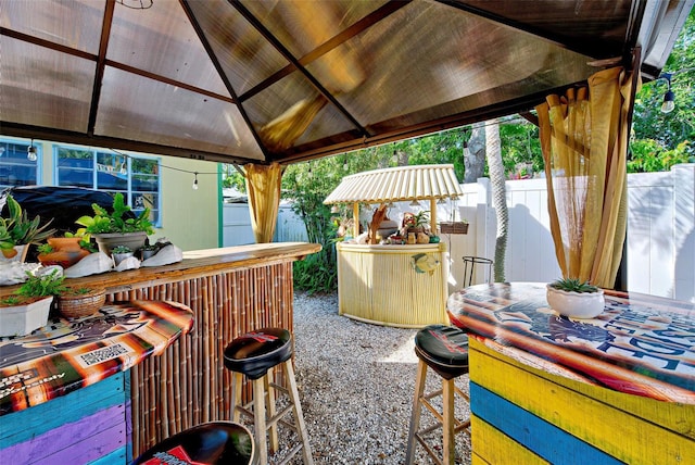 view of patio / terrace with a gazebo and an outdoor bar