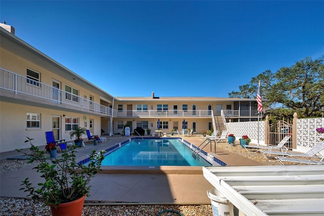 view of pool featuring a patio area