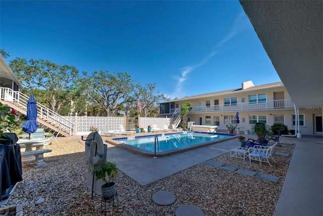 view of pool featuring a patio area