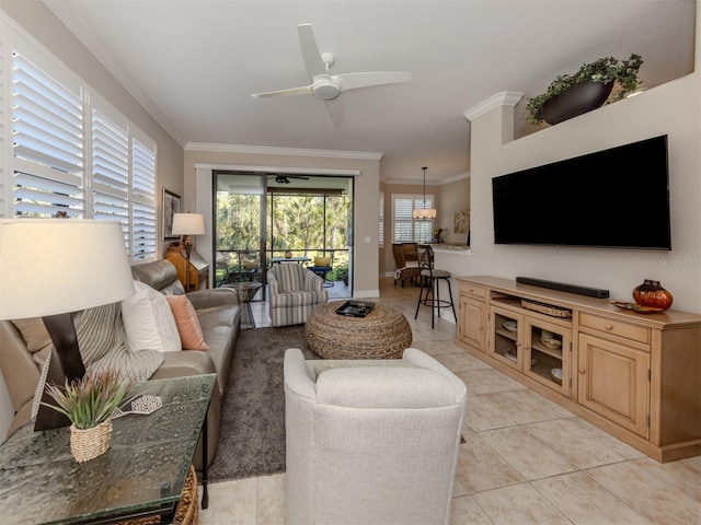 living room featuring ceiling fan, light tile patterned floors, and ornamental molding