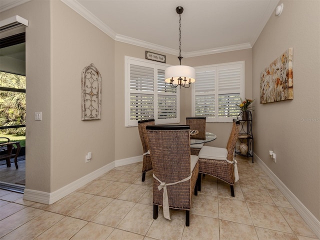 dining room with light tile patterned floors, crown molding, and an inviting chandelier