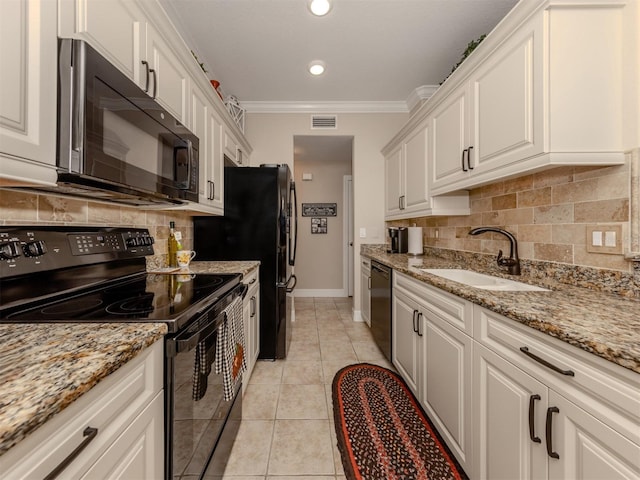 kitchen featuring sink, white cabinetry, crown molding, and black appliances