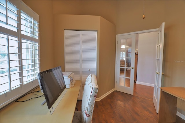 office area with french doors and dark wood-type flooring