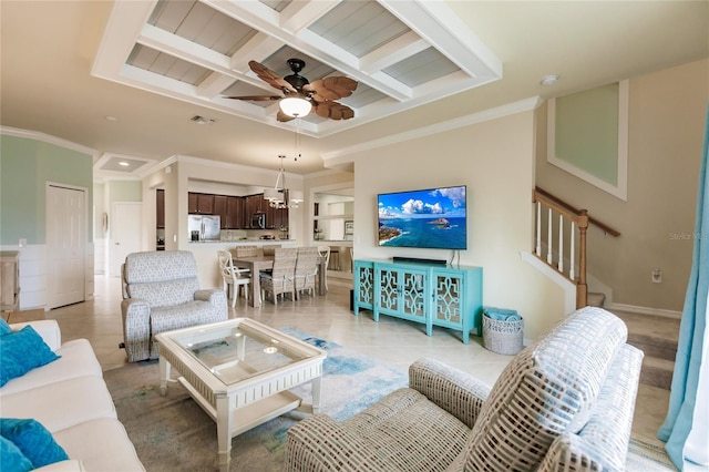 tiled living room with ceiling fan, beam ceiling, crown molding, and coffered ceiling