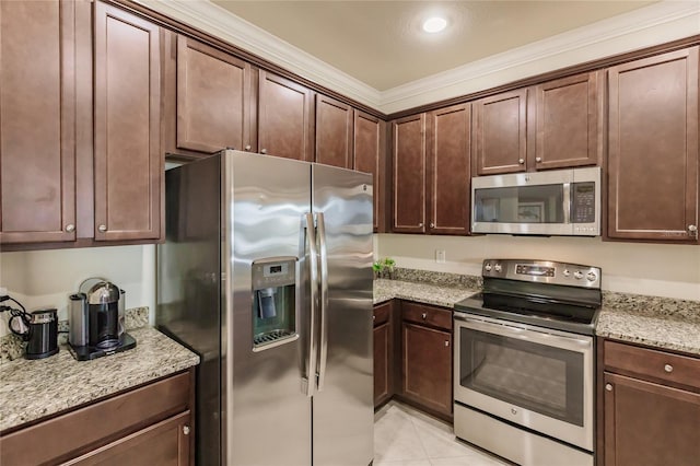 kitchen featuring light tile patterned floors, light stone countertops, crown molding, and appliances with stainless steel finishes