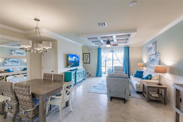 tiled dining area featuring ceiling fan with notable chandelier, ornamental molding, and coffered ceiling