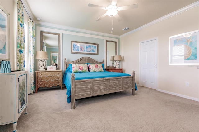 bedroom with light carpet, ceiling fan, and crown molding