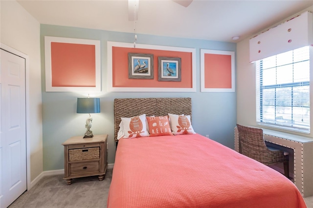 carpeted bedroom featuring ceiling fan