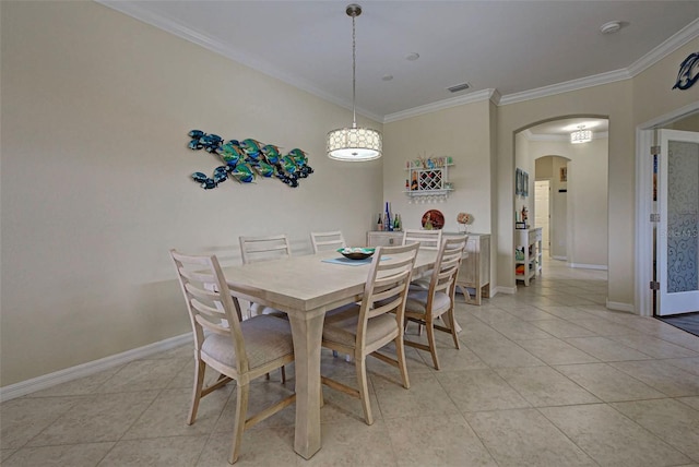 tiled dining area with crown molding