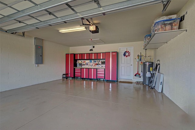 garage with electric water heater, electric panel, and a garage door opener