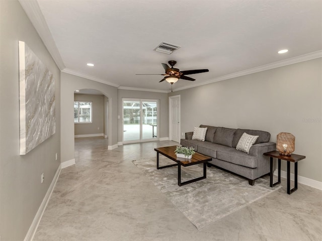 living room with ceiling fan and ornamental molding