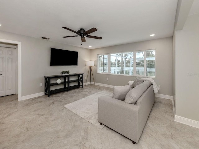 living room with ceiling fan