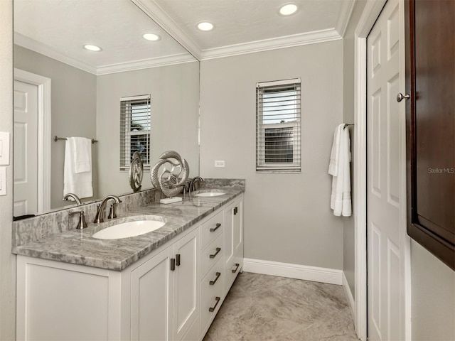 bathroom featuring vanity and ornamental molding