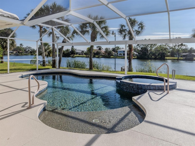 view of swimming pool featuring glass enclosure, a water view, and an in ground hot tub