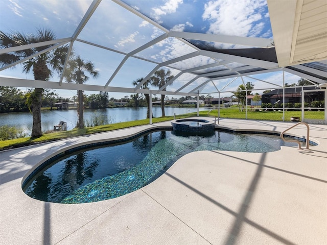 view of pool featuring a lawn, glass enclosure, a water view, an in ground hot tub, and a patio area