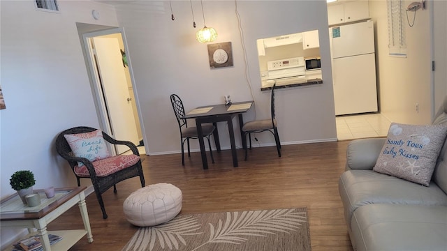 living room with dark wood-type flooring