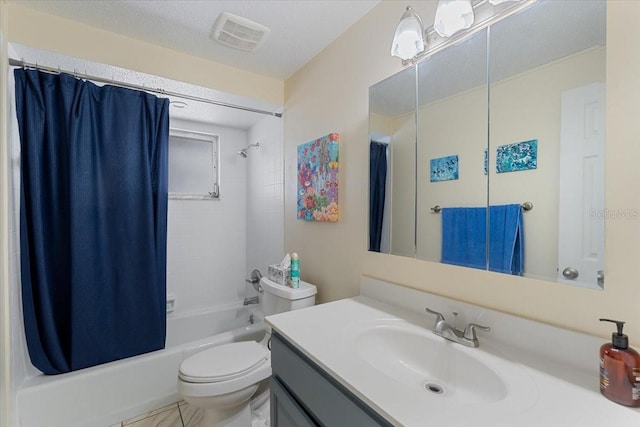 full bathroom with vanity, shower / bath combination with curtain, a textured ceiling, and toilet