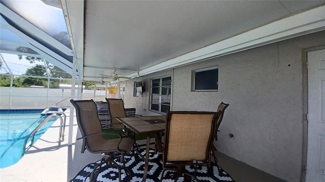 view of patio featuring a lanai and a fenced in pool