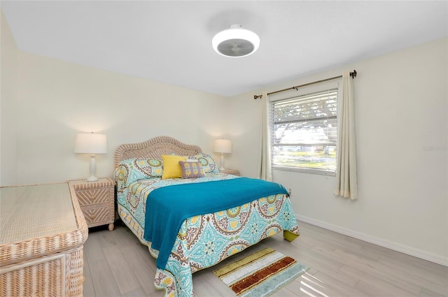 bedroom with light hardwood / wood-style flooring