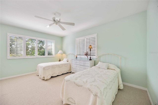 bedroom with carpet flooring and ceiling fan