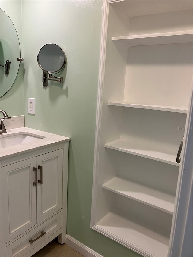 bathroom featuring vanity and tile patterned floors