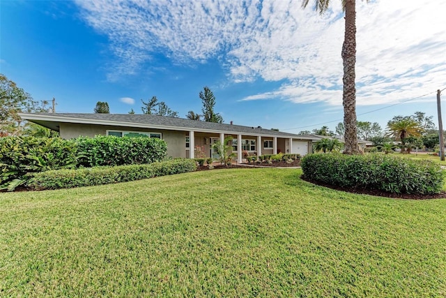 single story home with a front yard