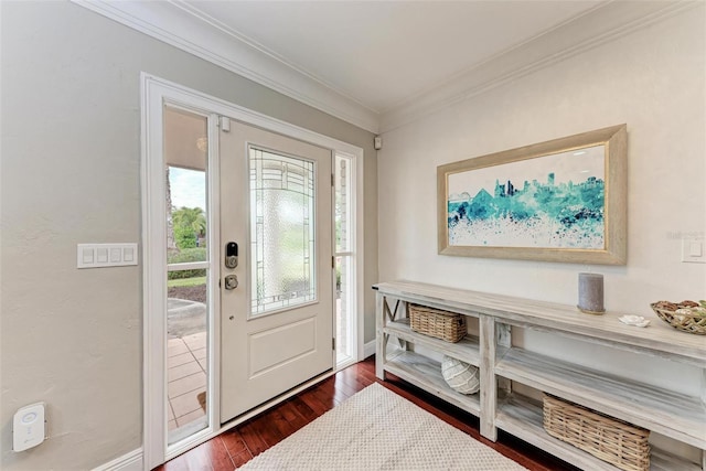 entryway with crown molding and dark hardwood / wood-style floors