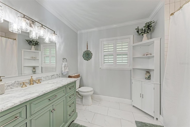 bathroom featuring toilet, vanity, a wealth of natural light, and ornamental molding